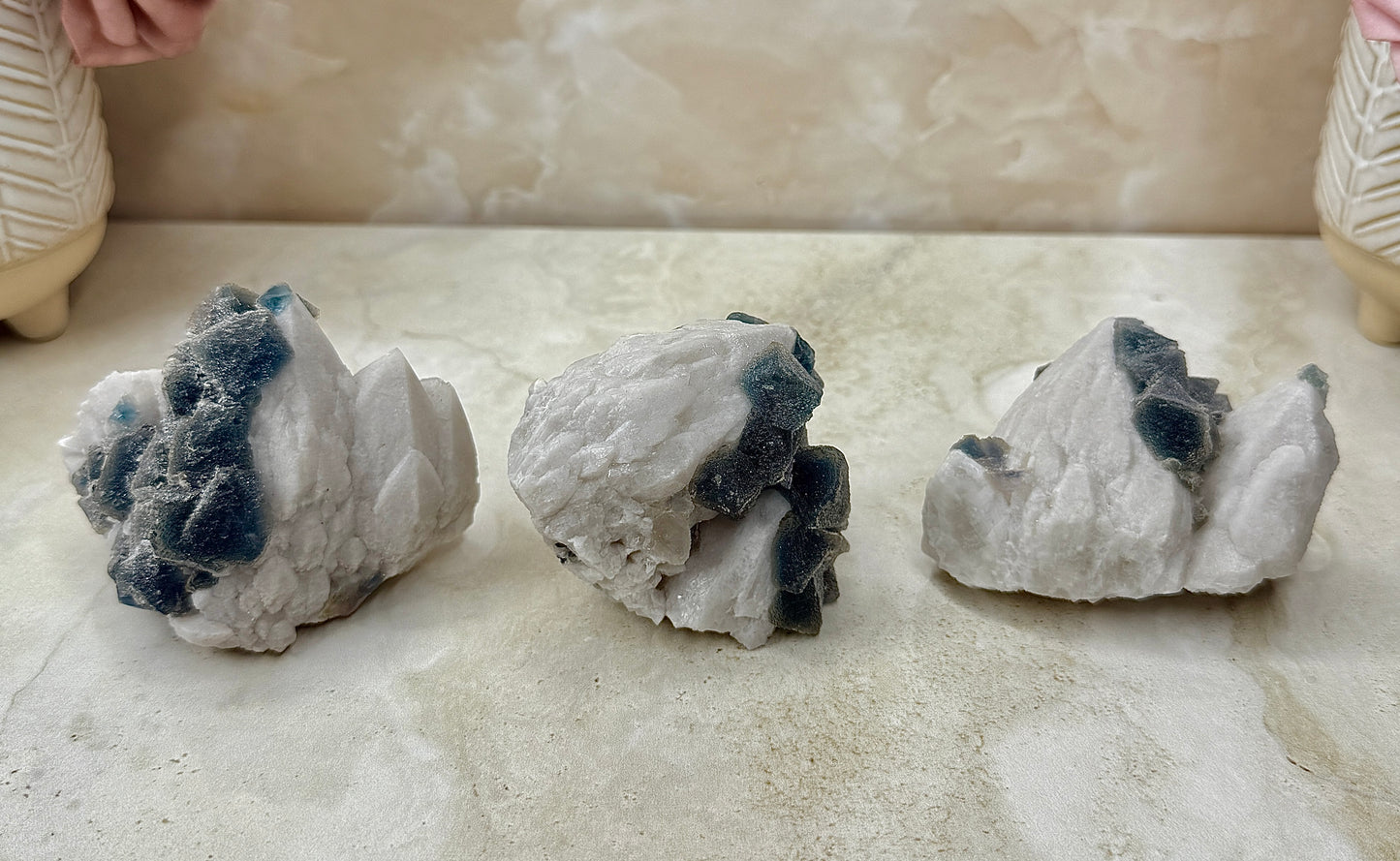 Octohedrical Fluorite on Candle Quartz