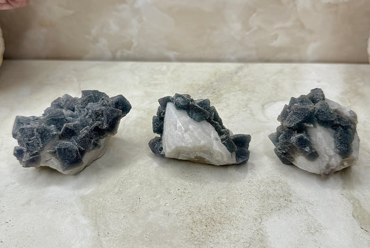 Octohedrical Fluorite on Candle Quartz